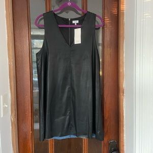 Black faux leather V-Neck tank dress. Tobi size L